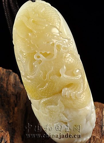 白玉子料把件-臥虎藏龍