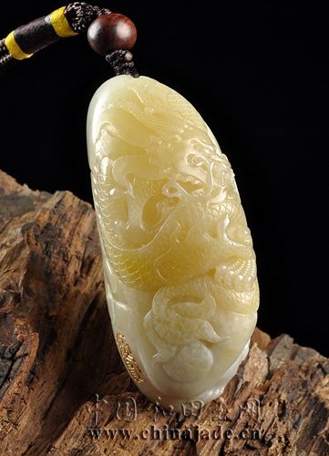 白玉子料把件-臥虎藏龍