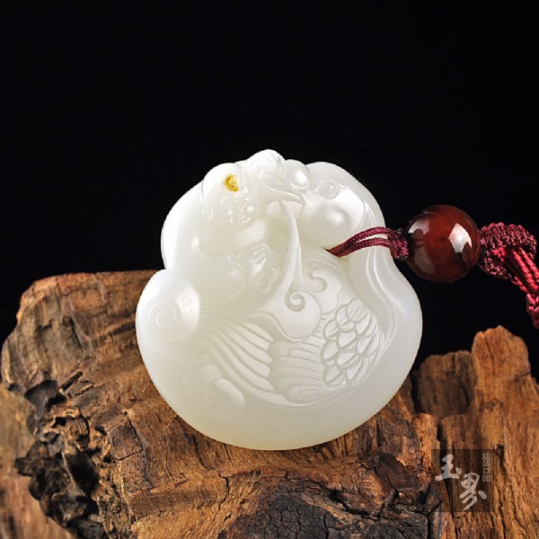 白玉子料把件-童子戲鵝 